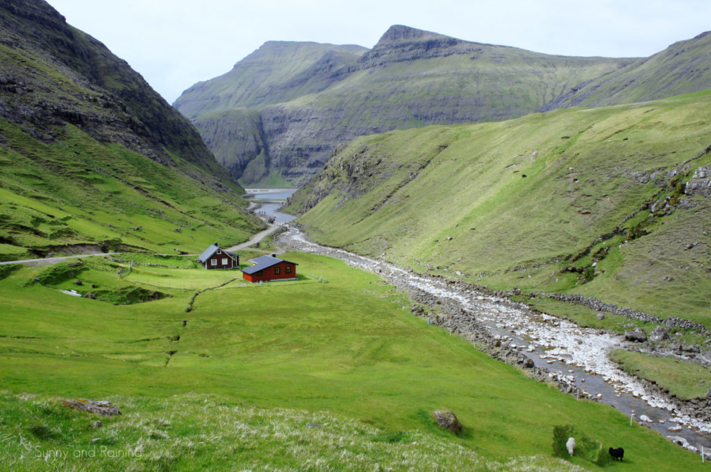 A red house sits in the village of Saksun. 