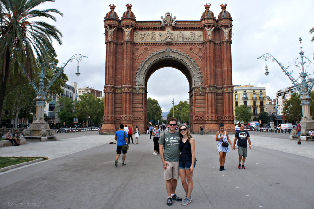Standing under Barcelona's Arc de Triomphe